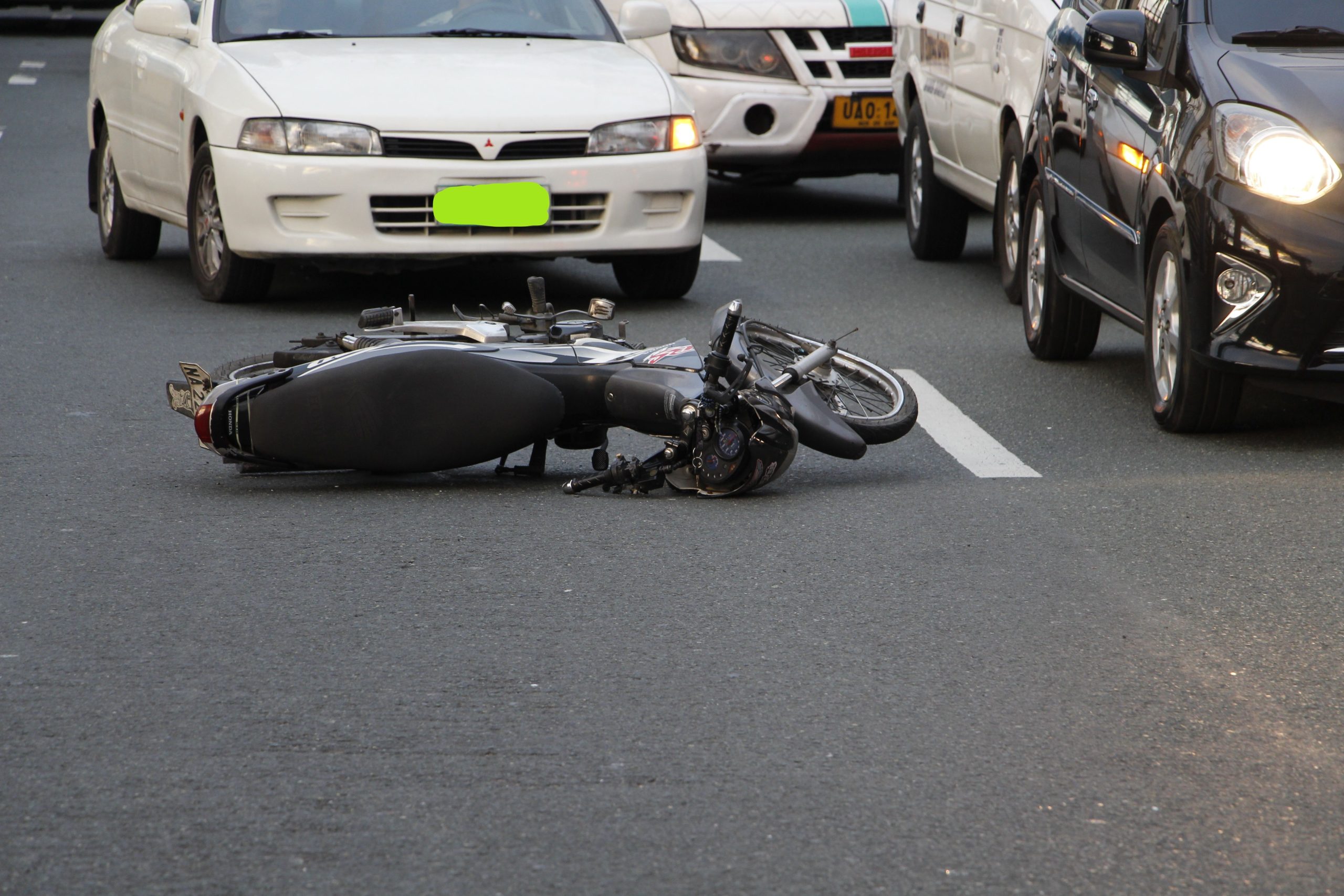 fallen motorcycle on the road