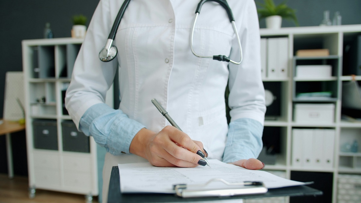 doctor holding medical records